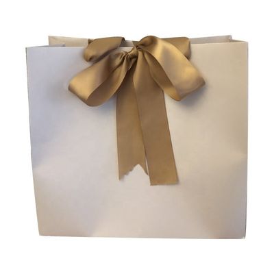 Customized Color 100g Craft Shopping Paper Bag With Ribbon Handle